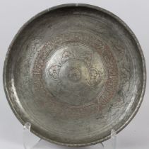 A SINI SCRIPT TINNED COPPER DISH decorated with engraved calligraphy lotus flowers and lotus petals.
