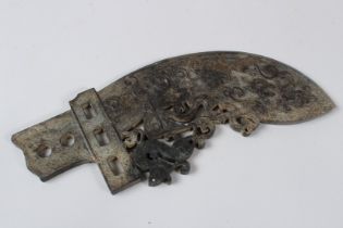 A CHINESE CARVED JADE KNIFE with pierced decoration. 12ins long.
