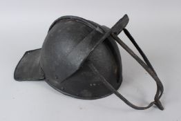 A CROMWELLIAN TRIPLE BAR METAL HELMET. Circa 1640.