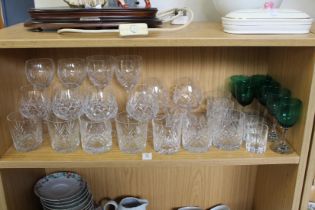 A shelf of glass including ten whisky tumblers.