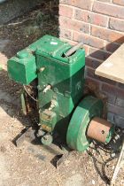 A stationary engine and part.