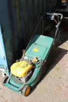 A Yardman 55-4 rotary mower.