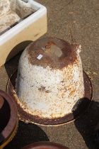 A cast iron cauldron.