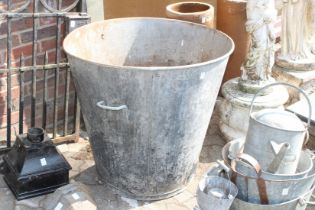 A large galvanized tub, circular size. 2ft 6ins diameter.