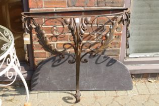 A marble top wrought iron demi-lune console table. 2ft 9ins wide.