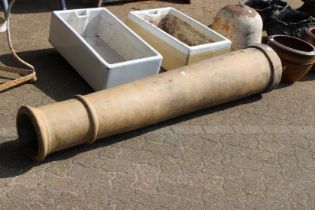 A large chimney pot. 6ft 3ins long.