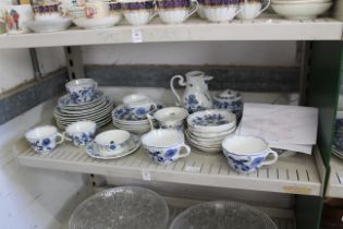 A shelf of Meissen china.