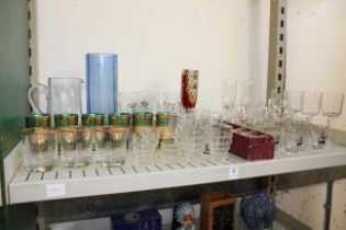 A shelf of glassware.