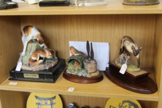 Three pieces of Border Fine Arts sculptures.