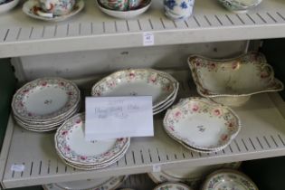 A shelf of Bloor Derby plates and dishes.