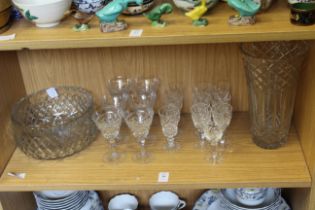 A shelf of glassware.