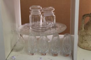 A shelf of glassware.
