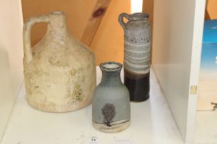 Three studio pottery vessels.