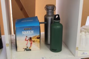 Three water bottles.