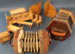 Two accordions, miniature furniture and wooden book ends