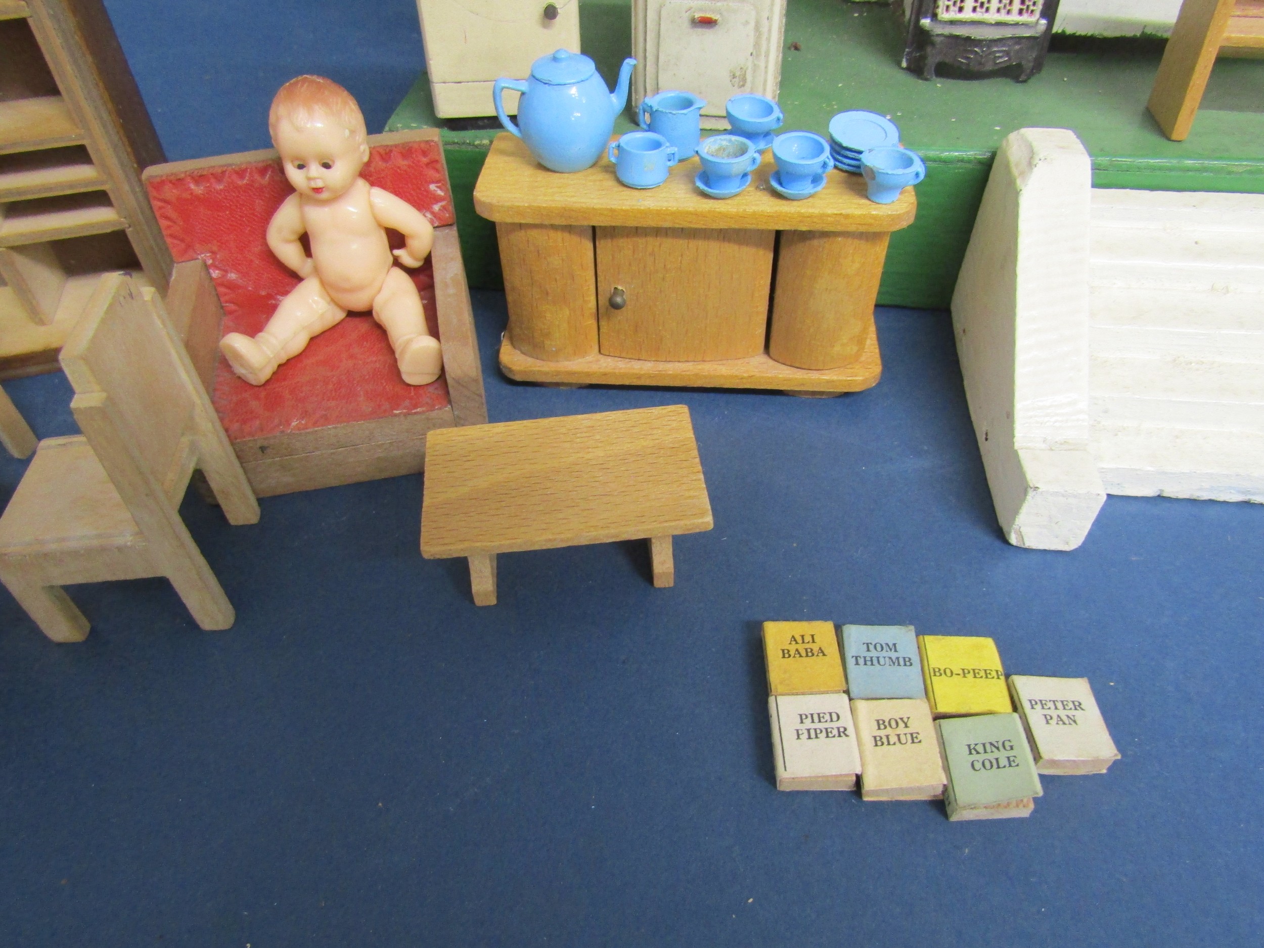 Dolls house with furniture includes metal mangle, fire and tea set, wooden furniture some with - Image 3 of 10
