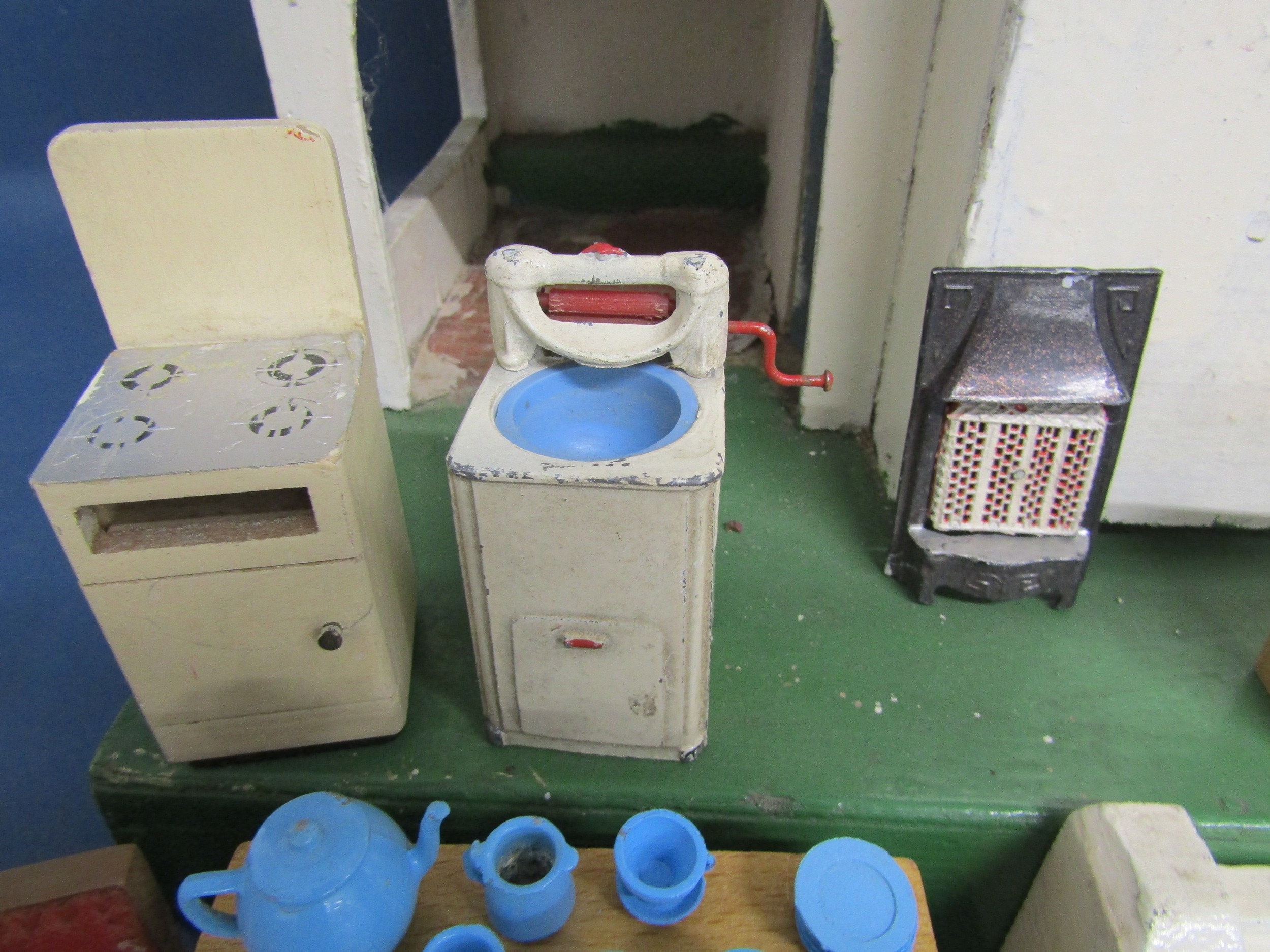 Dolls house with furniture includes metal mangle, fire and tea set, wooden furniture some with - Image 7 of 10