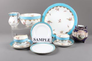 A late 19th century bone china full decorated part teaset with turquoise and gilt borders