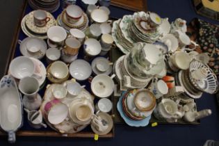 A quantity of teacups and saucers including Continental cups and saucers, a Royal Albert “Lavender