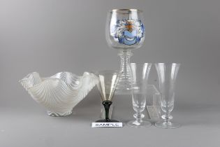 A German glass goblet with painted armorial, a set of six ribbed design champagnes, a handkerchief