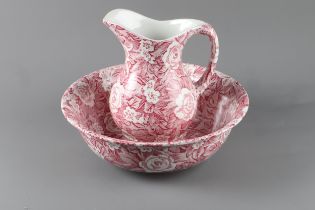 A Burleigh ware red floral decorated toilet jug and basin, jug 9" high