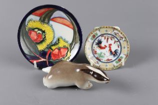 A Moorcroft pin dish, 4 1/2” dia, a smaller French porcelain dish with cockerel decoration, 3”