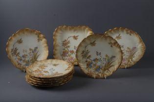 A Limoges porcelain floral decorated part dessert service