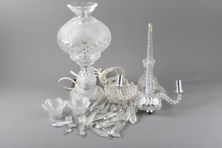A Waterford Crystal table lamp, 13 3/4” high, and a Waterford Crystal candelabra (for restoration)