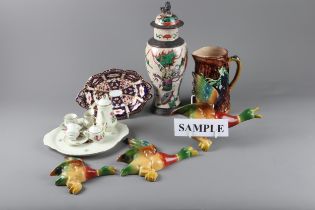 A Royal Crown Derby two-handled dish, 8” wide, a set of three graduated painted metal wall mounted