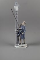 A Lladro lamplighter figure, 18 1/2" high