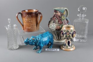 A 19th century salt glazed three-handled tyg, a sprigged jug, a Stein and other ceramics and glass