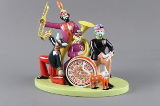 A Coalport Characters limited edition figure group “Sgt Peppers Lonely Hearts Club Band” 236/1000,