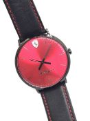 A Scuderia Ferrari Ultraleggero wristwatch in red/black on original leather strap.