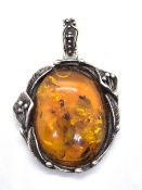 A large and impressive Amber pendant, approx 6cm in length.