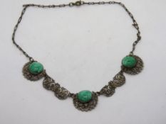 A mid century Bohemian necklace having p