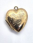 A 9ct gold plated heart locket.