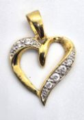 A 9ct gold on silver heart pendant.