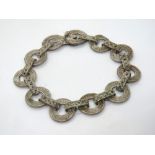 A filigree panel bracelet, no apparent h