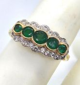 A classic emerald and diamond 18ct gold ring,