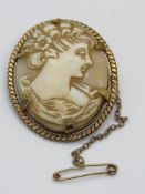 A carved shell cameo in 12ct rolled gold
