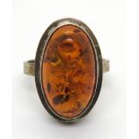 A silver and amber ring, size P
