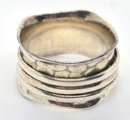 A silver fidget spinner worry ring, stamped 925, size N-O.