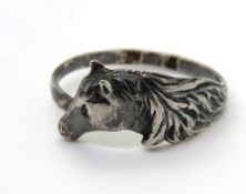 A horse head ring, no apparent hallmarks