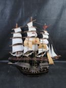 Two model sailing ships.