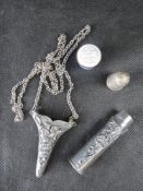 A small enamelled pill pot together with a hallmarked silver thimble and two other sewing themed