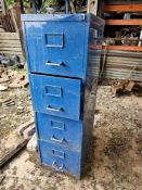 A four drawer filing cabinet.