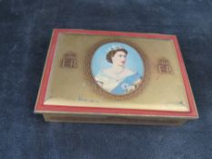 A commemorative Queen Elizabeth II Coronation Wills Cigarettes tin.