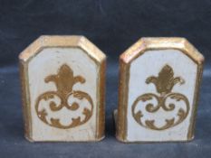 A pair of antique Baroque Revival Italian giltwood bookends.