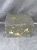 A late 19th / early 20th century black lacquered box decorated with oriental birds.