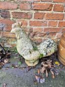 A cast concrete cockerel garden figure.